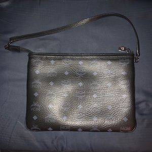 Authentic MCM Pouch Clutch In Black